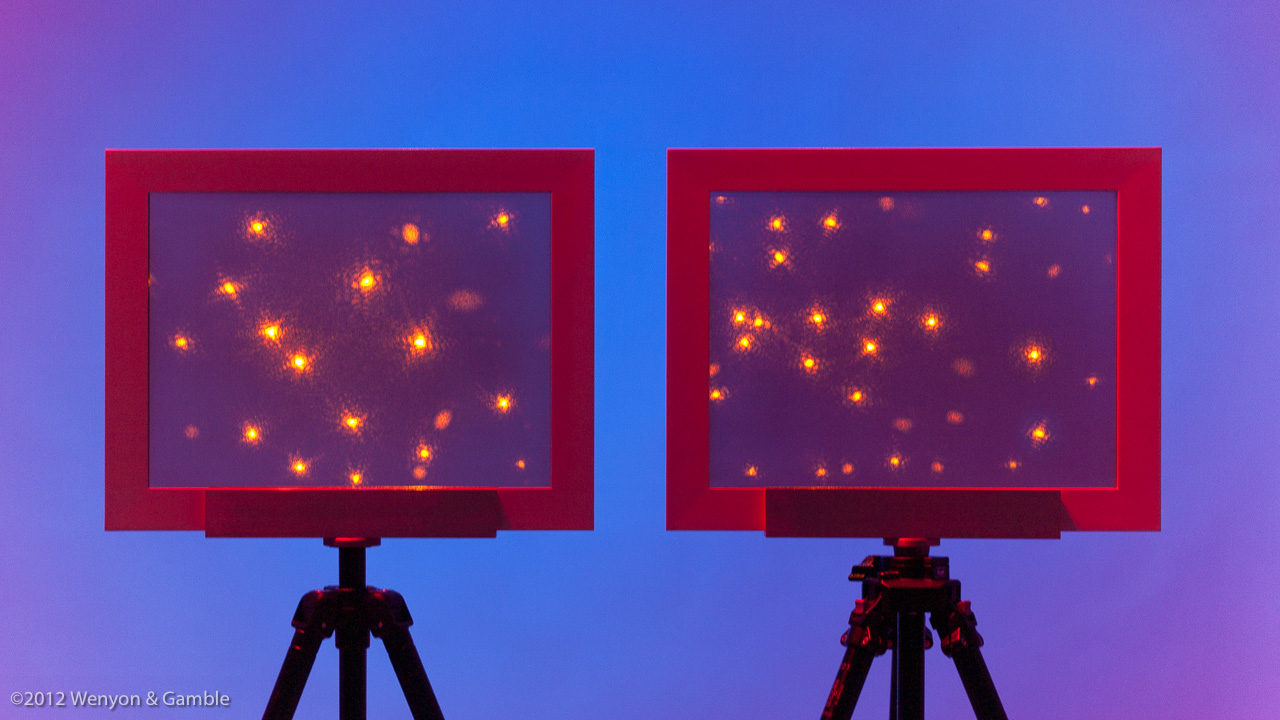 Little Points: First & Second Quadrants, Wenyon & Gamble, 2012. Two holograms (silver-halide emulsion on glass) in wood frames, mounted on tripods, installed with colored-light projection behind and illuminated by yellow lasers, 12.6 x 16.9 in (320 x 430 mm) in A Universe held up for Inspection